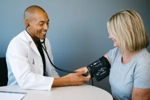 Concierge medicine cost comparison showing membership fees versus traditional healthcare hidden costs and time waste