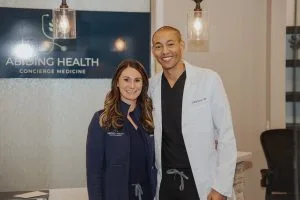 Physician discussing healthcare options with patient - direct primary care vs concierge medicine